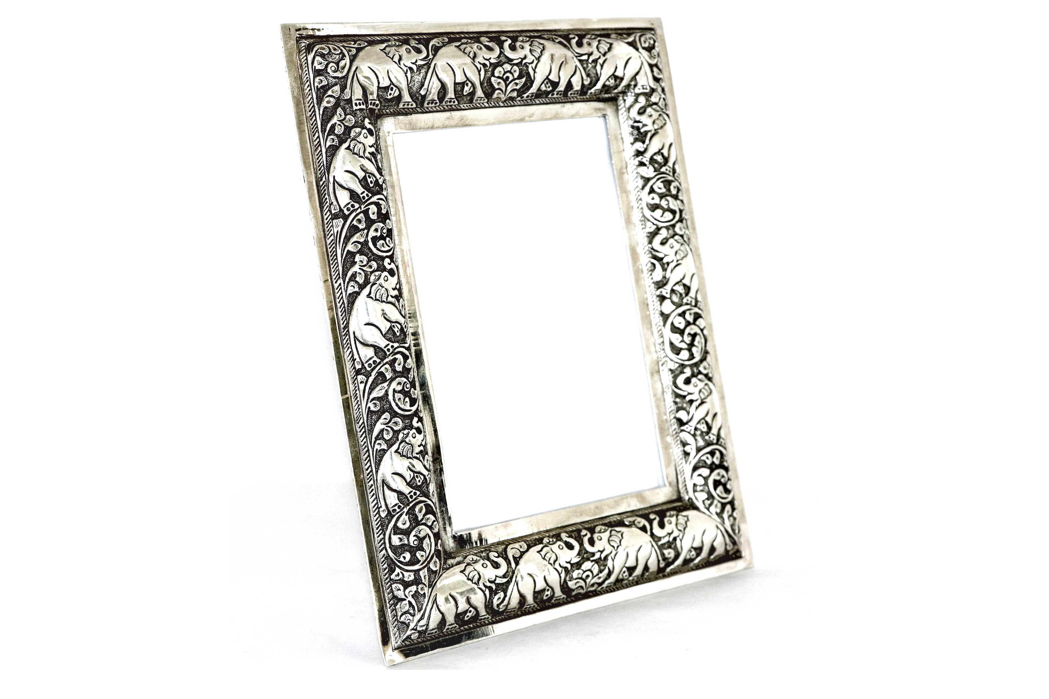 Antique silver frame with elephant embossed design